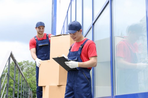 House removalists in Chessington loading furniture into a moving van