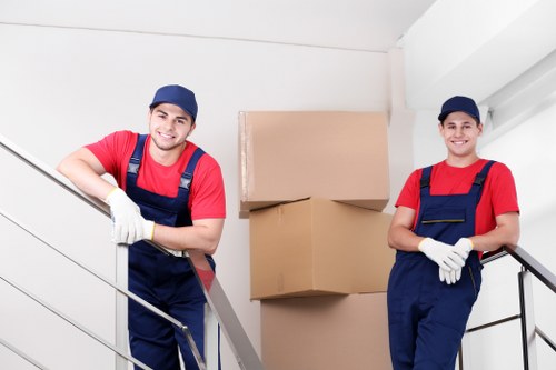 Local moving van helping with furniture transport in Chessington