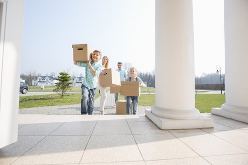 Professional team handling piano removals in Chessington with specialist moving equipment