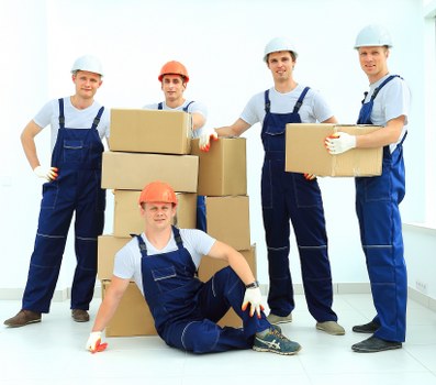Packing supplies and boxes arranged for storage and shipping in Chessington