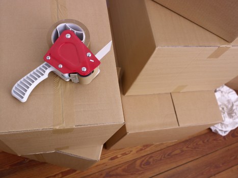 Professional movers loading furniture for a student move