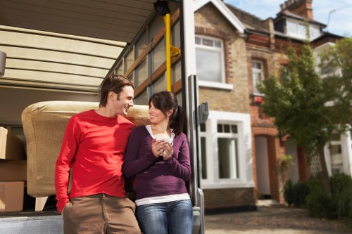 Business move preparation with labelled office items and moving supplies